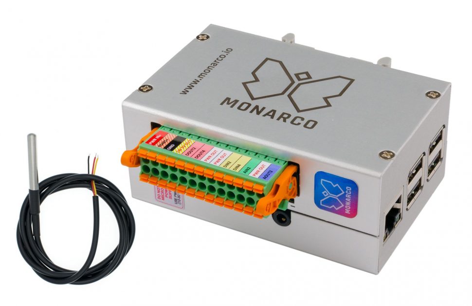 Monarco HAT and Raspberry Pi in a DIN-rail enclosure. Horizontal, with connector and temperature probe.